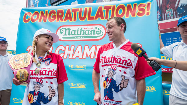 miki-sudo-joey-chestnut-win-hot-dog-contest.jpg